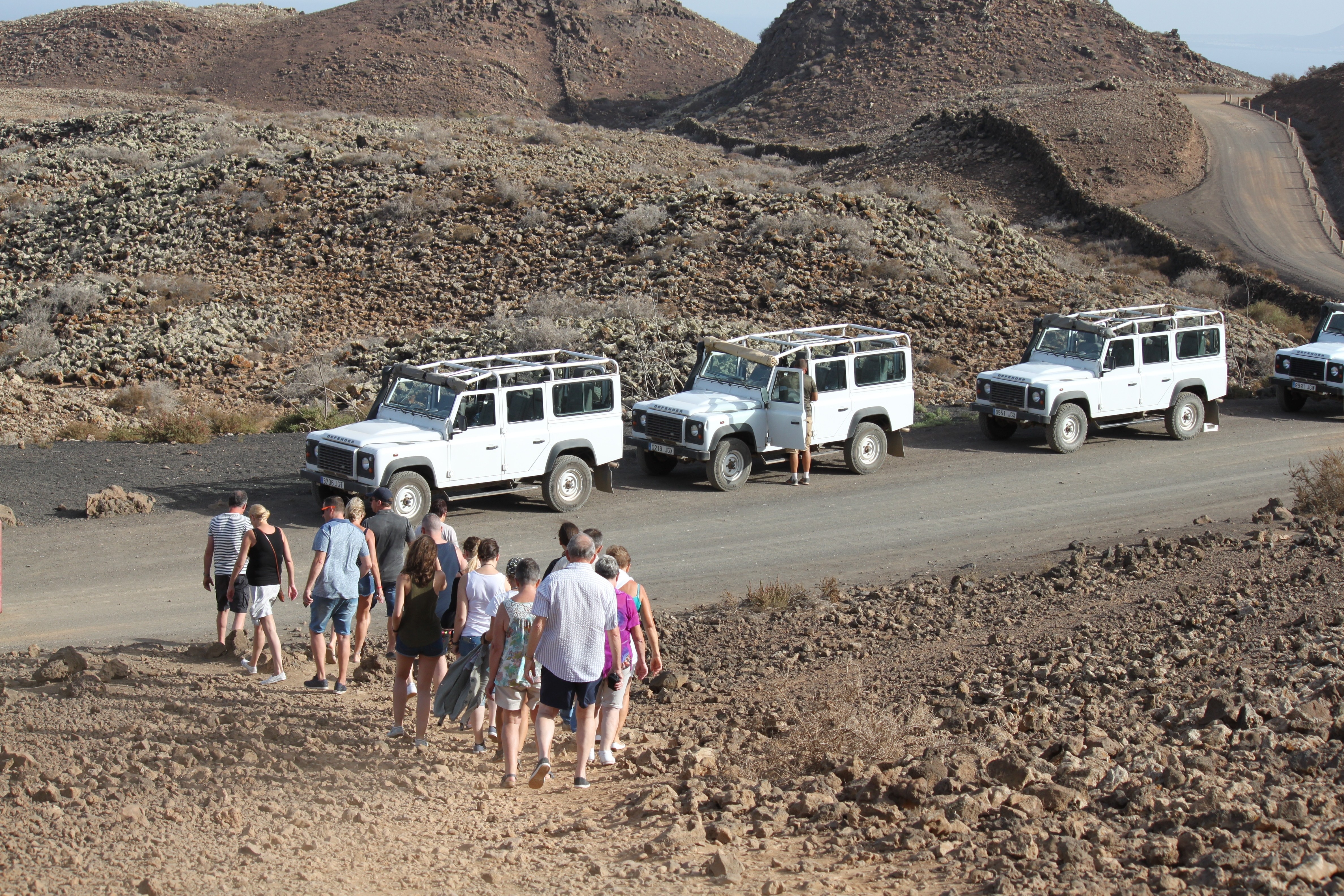 Jeep Defender driving through the beaches and trails of El Cotillo